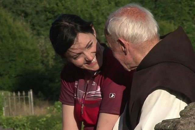 Megan having a chat with Father Ignatius