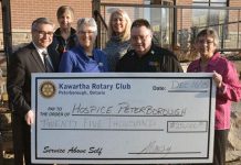 The Rotary Club of Peterborough-Kawartha presents a $25,000 cheque to Hospice Peterborough. Left to right: Rotarian Carl Brown, Campaign Chair Betty Morris, Hospice Executive Director Linda Sunderland, Rotarians Liz Lewis Woosey and Lou Hamel, Auction Chair Kim Winter. (Photo courtesy of Hospice Peterborough)