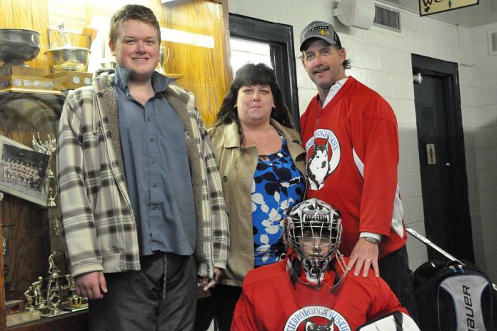 Cathie and Dave Tuck, founders of the Peterborough Huskies special needs hockey team, with their sons Jeffrey (left) and Criss (photo courtesy of the Peterborough Huskies)