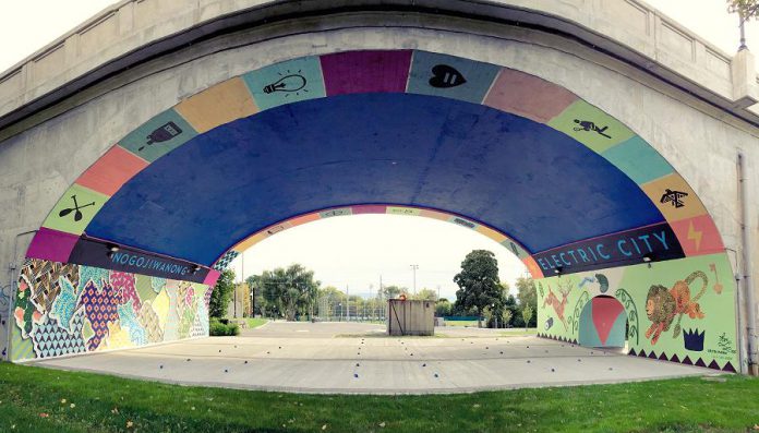 The City of Peterborough's Public Art Program and the Downtown Business Improvement Area want to bring public art to downtown Peterborough, similar to this mural by Kirsten McCrea under the Hunter Street Bridge funded by the Public Art Program (photo courtesy of Artspace)