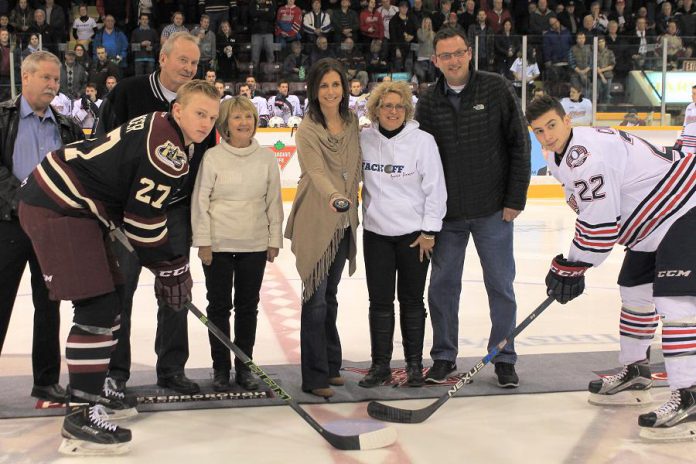 Manon Rhéaume, the first and only woman to play in the NHL, drops the ceremonial puck alongside Susan Dunkley of the Alzheimer Society. Although the Petes lost 4-3 to the Oshawa Generals, the event raised over $16,000 for the Alzheimer Society. (Photo courtesy of the Peterborough Petes)