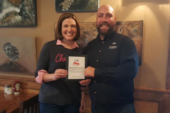 Tour de Fork organizer Jaimie Bondy-Donohue with Travis Smith, Front of House manager at Ashburnham Ale House. Ashburnham Ale House is one of 12 Peterborough restaurants participating in the first annual fundraiser in support of the Fairhaven Foundation, which runs from February 1 to 7. (Photo: Jeannine Taylor / kawarthaNOW)