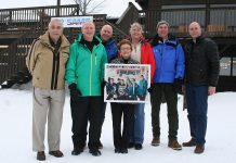 The Bishop family has been operating the family-oriented Sir Sam's Ski/Ride in Haliburton for 50 years. Founders Bob (left) and Noreen (holding the circa-1970 family photo) remain involved in the resort's operation.