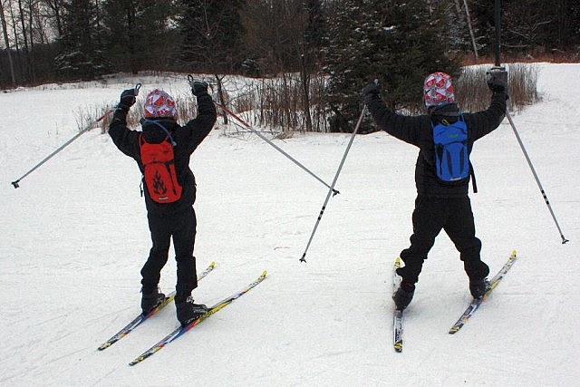 Friends ski together at Kawartha Nordic in Peterborough County. Play together and stay together with some outdoor activities such as skiing, tobogganing, or skating. (Photo: Karen Halley)