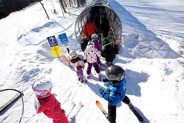Parents love Sir Sam's climate-controlled covered ski lift, the first in Canada, which protects young skiers from the elements