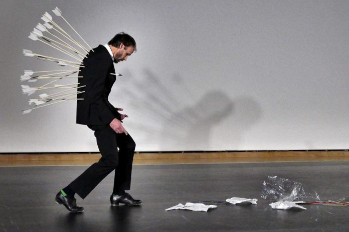 Bill Coleman performing an excerpt from "Dollhouse" at the Mackenzie Art Gallery in Regina, with a costume by renowned artist Edward Poitras (photo: Sarah Abbott)