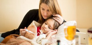 Mother with child sick with the flu