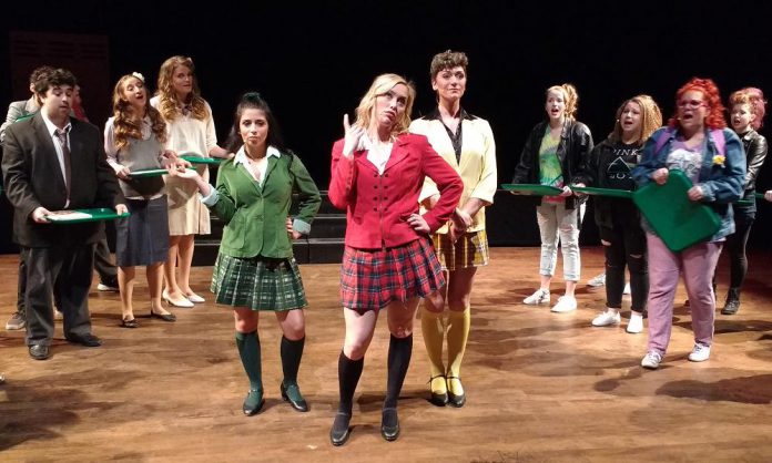 Hope Clarkin as Heather Duke, Audrey Massender as Heather Chandler, and Jesse Morrison as Heather Macnamara in The Anne Shirley Theatre Company's production of "Heathers: The Musical"