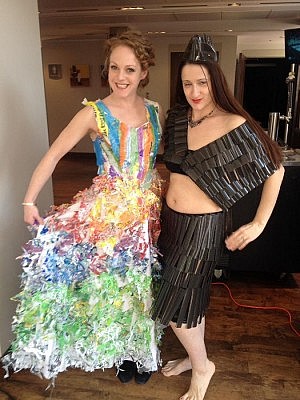Sarah McNeilly and Sarah Rudnick provided a taste of what to expect at the Wearable Art Show on May 14 at the Market Hall in Peterborough: McNeilly is wearing a design made entirely of fused plastic film, created by Lisa Marchant, while Sarah Rudnicki is wearing a design made entirely of 35mm movie film, created by Hartley Stephenson (photo: Paul Rellinger / kawarthaNOW)