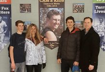 The Hicks family: Mitchell, Linda, Cameron (on poster), Andrew, and Gord. The family founded Cam's Kids in honour of Cam who, after overcoming anxiety issues as a teenager, was tragically killed by a motor vehicle at the age of 19 early in his first year at the University of Ottawa (photo courtesy of Cam's Kids)