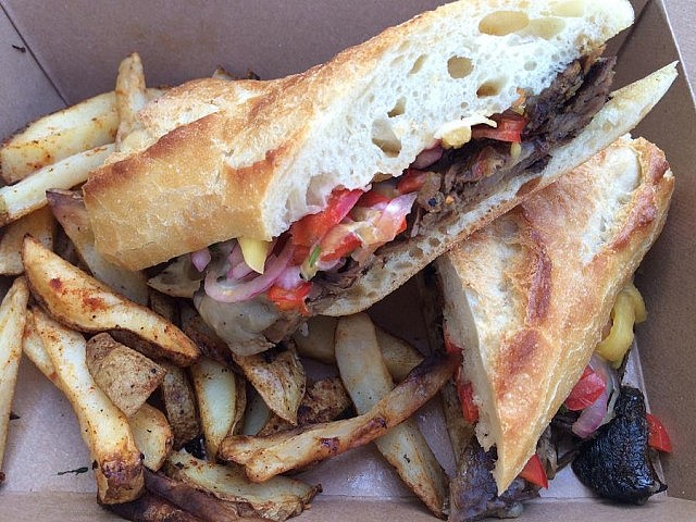 "The Beef" sandwich at Peterborough EATS is made with slow-roasted beef chuck from Primal Cuts; shown with russet potato wedges, which are tossed and baked in a french marinade (photo: Eva Fisher)