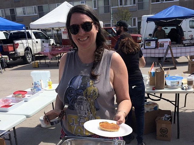 Market manager Jill Bishop serves free pancakes to those who attended the first Peterborough Downtown Farmers' Market of the year (photo: Eva Fisher)