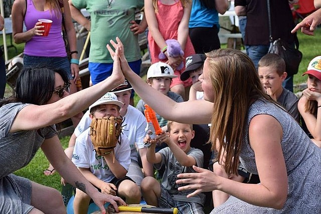 Having fun participating in a Hammerschlagen challenge at the Partington's annual yard sale and barbecue (photo: Kristian Partington)