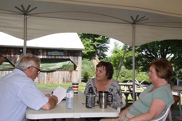 kawarthaNOW writer Paul Rellinger interviews playwright Maja Adral and actor Lorna Green. The experiences of Lorna's father George O'Brien, whose own father was killed during the Quaker Oats factory explosion, is the basis for the play.  (Photo: Jeannine Taylor / kawarthaNOW)