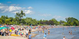 Families enjoying Victoria Beach on Lake Ontario in Cobourg. (Photo courtesy of Linda McIlwain)