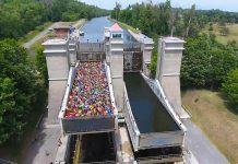 A screenshot from the drone video showing the 138 canoes and kayaks being lifted in the Peterborough Lift Lock