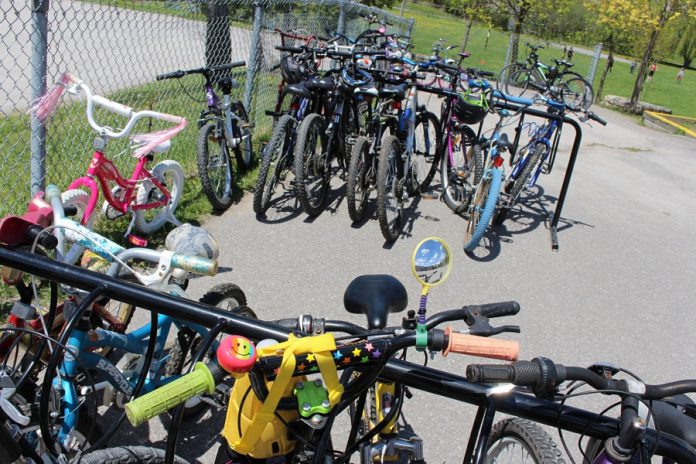 Bicycles locked up at Highland Heights Elementary School this spring; the Active and Safe Routes to School Committee brought 25 bike racks to elementary schools across Peterborough City and County with help from the Healthy Kids Community Challenge Peterborough (photo: Karen Halley)