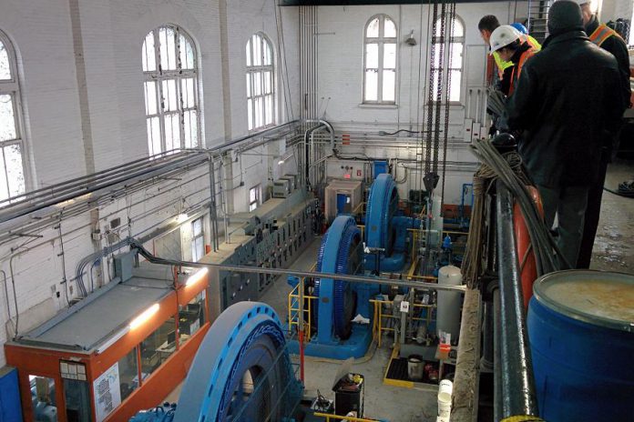 Before the expansion, the three turbine-driven generators at the London Street facility each produced around 1.3 megawatts of power from the flow of water in the Otonabee River. With the expansion, the facility now has the capacity to produce 10 megawatts of green power. (Photo: Bruce Head / kawarthaNOW.com)
