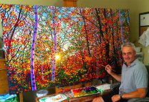 The photo of Tim Packer and his painting that went viral on LinkedIn, causing the site to temporarily suspend his account (photo: Tim Packer / LinkedIn)