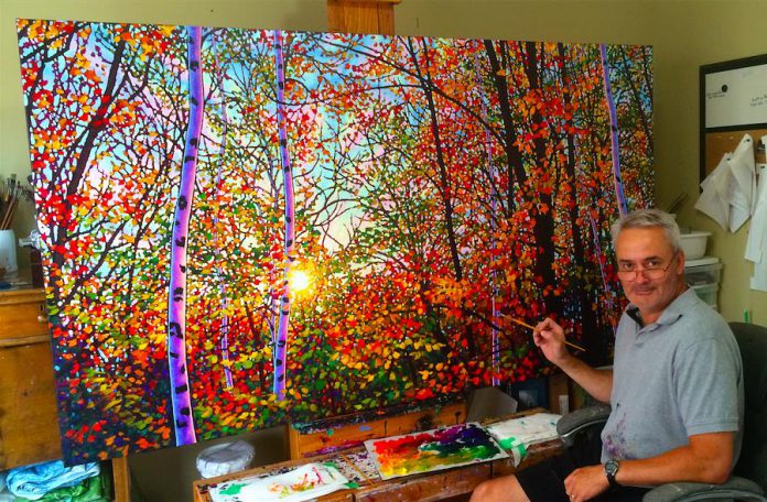 The photo of Tim Packer and his painting that went viral on LinkedIn, causing the site to temporarily suspend his account (photo: Tim Packer / LinkedIn)