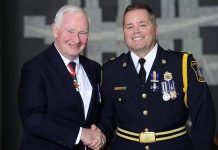 Governor General David Johnston congratulates Peterborough Police Service Deputy Chief Timothy Farquharson, who receiving the Order of Merit of the Police Forces for a Member (supplied photo)