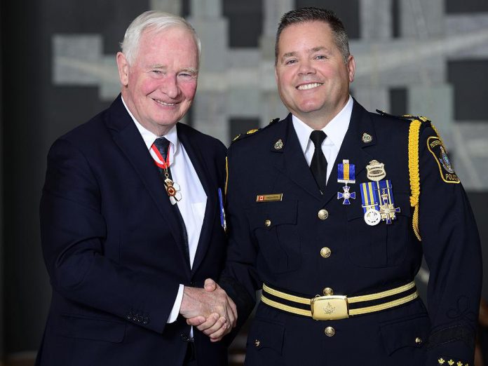 Governor General David Johnston congratulates Peterborough Police Service Deputy Chief Timothy Farquharson, who receiving the Order of Merit of the Police Forces for a Member (supplied photo)