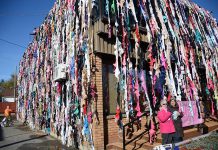 Donna Chamberlain, who alone collected 1,953 bras, with My Left Breast owner Bridget Leslie in front of the Country 105/Energy 99.7 building in downtown Peterborough (photo: Eva Fisher)