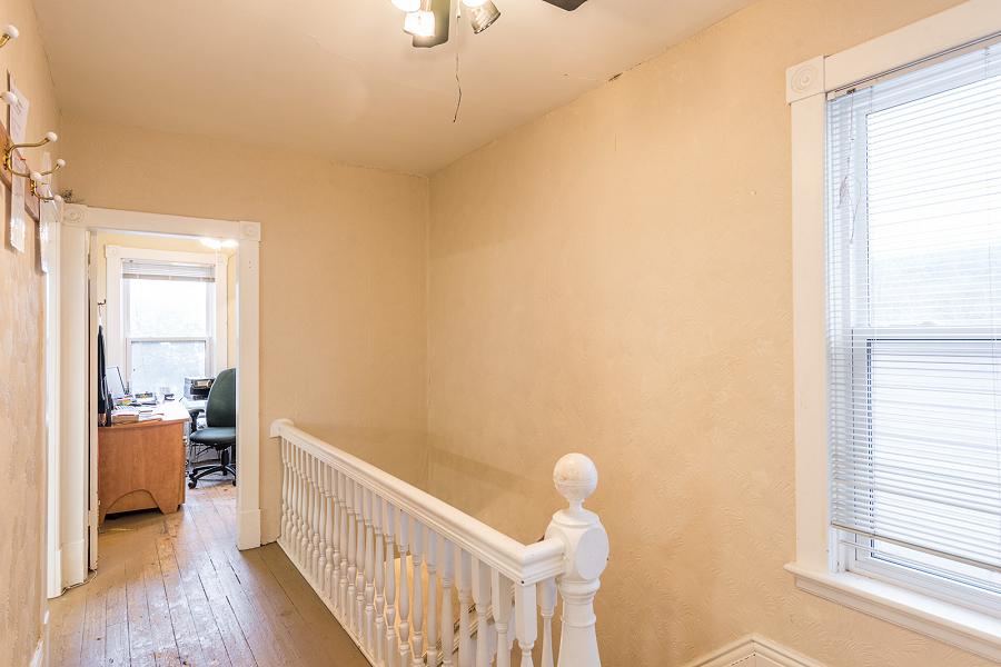 The second floor, with its beautiful hardwood floors, could be used as an apartment. (Photo: Doug Logan, Fine Homes Photography)