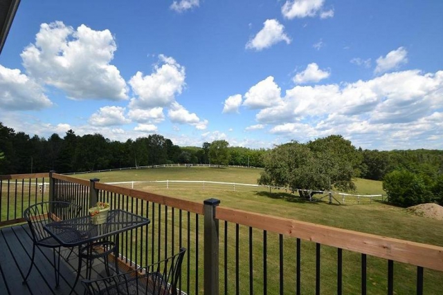 The balcony overlooks rolling countryside replete with mature trees and beautiful fields. (Photo: Dan Parker)
