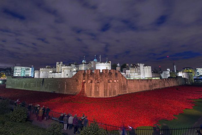 "Blood Swept Lands and Seas of Red" was a work of installation art placed in the moat of the Tower of London in England, between July and November 2014, to commemorate the centenary of the outbreak of World War I. It consisted of 888,246 ceramic red poppies, each intended to represent one British or Commonwealth serviceman killed in the War. The work's title was taken from the first line of a poem by an unknown World War I soldier. (Photo: Wikipedia)