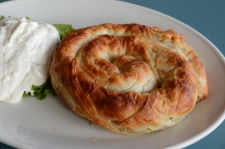 Spanakopita is Nicki's favourite dish, and it's served with a generous portion of tzatziki on the side. (Photo: Eva Fisher)