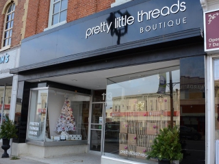 Be sure to check out the window displays as you enter Lindsay fashion boutique Pretty Little Threads. (Photo: Eva Fisher)