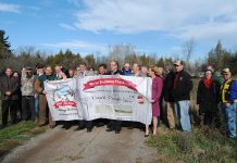 Officials including Peterborough-Kawartha MP Maryam Monsef, County of Peterborough Warden J. Murray Jones, and MPP Peterborough and Minister of Agriculture, Food and Rural Affairs Jeff Leal participating in the federal government funding announcement on November 10, 2016 at Lang Pioneer Village Museum in Keene (photo: County of Peterborough)