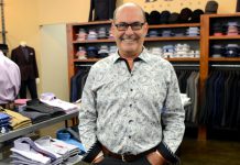 John Martin, owner of John Roberts Clothiers in downtown Peterborough, shows how to achieve an office-appropriate look with this Au Noir shirt. No tie is required, as the collar looks great unbuttoned. (Photo: Eva Fisher)