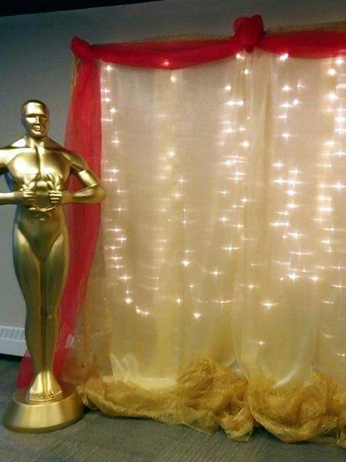 Century 21's Christmas party had an Oscars theme, complete with a red carpet and selfies with this Oscar statue. (Photo: Swanky Events)
