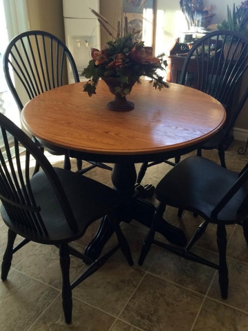 Jamie updated this wooden dining set with black paint, creating a high end look. (Photo: Style Your Nest)