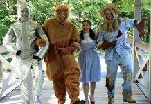 In its magical production of The Wizard of Oz, St. James Players brings the beloved characters to life with Robert Hedge as the Tin Man, Keevin Carter as the Cowardly Lion, Hope Clarkin as Dorothy, and Drew Mills as the Scarecrow (photo: St. James Players)