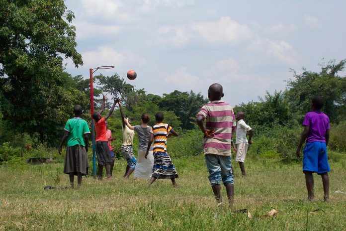 Ennismore native Alli Bunting has been working for a community-based organization in Jinja, Uganda called Arise and Shine. Here she learns how to play netball with primary students at the Arise and Shine Primary School in Kibuye village in Uganda. (Photo: Alli Bunting)