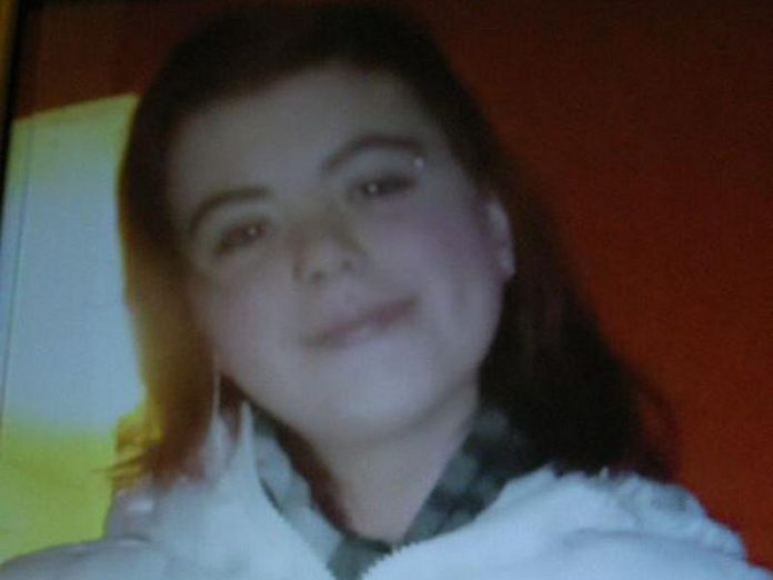 15-year-old Chanel Smith is 5'5", has short red hair, and was last seen wearing a white waist-length hooded winter coat (supplied photo)