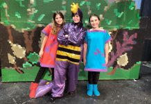 Katherine Mason as Widget, Samuelle Weatherdon as Mortimer the Dragon, and Emily Keller as Hairytoes at a dress rehearsal for "The Reluctant Dragon", the Peterborough Theatre Guild's annual holiday family play which opens on December 6 (photo: Sam Tweedle / kawarthaNOW)