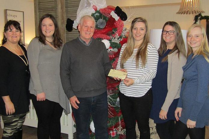 Peter Gallow of Ballantrae won the Kawartha Chamber of Commerce & Tourism's contest to promote its new website, and he's chosen to redeem his $1,000 gift certificate at Lakeshore Designs. Also pictured: Chamber 1st Vice President Cindy Windover, Marketing Committee Representative Eva Fisher, and staff from Lakeshore Designs.