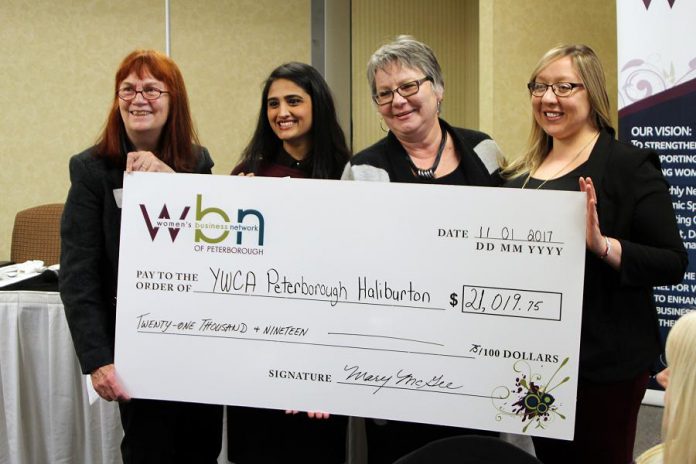 YWCA Peterborough Haliburton Executive Director Lynn Zimmer (left) and Special Events Coordinator Nicole Pare (right) accept the $21,019.75 cheque from WBN Program Directors Sana Virji and Louise Racine (photo: Paula Kehoe / WBN)