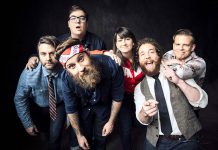 Four of the six members of The Strumbellas, including songwriter and frontman Simon Ward (with the bandanna), are natives of Lindsay, Ontario (publicity photo)