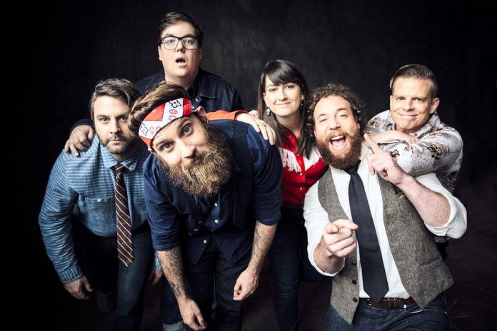 Four of the six members of The Strumbellas, including songwriter and frontman Simon Ward (with the bandanna), are natives of Lindsay, Ontario (publicity photo)