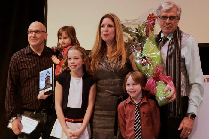 Tina Bromley with her husband Winston Bromley, left, and their children at the Win This Space contest finale on February 16 at The Venue in downtown Peterborough. Bromely won the competition which includes a free 12-month lease of a downtown Peterborough storefront for her business Tiny Greens. (Photo courtesy of Peterborough DBIA)