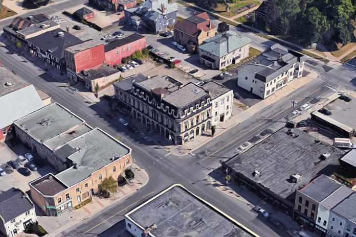 An aerial view of the Morrow Building at George and Brock streets in downtown Peterborough, with the two adjoining buildings housing the Black Horse Pub and the Pig's Ear Tavern. While the Morrow Building itself was designated as a heritage building in 1995, Peterborough City Council has decided not to approve heritage designation for the adjoining buildings, allowing them to be redeveloped by Parkview Homes. (Photo: Google)