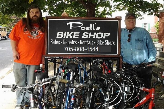 Patrick Poell with his dad Ed of Poell's Bike Shop, which recently moved to 366 George Street in downtown Peterborough