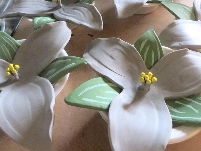 Ceramic trilliums drying at the Kawartha Potters Guild. Created by volunteers, 600 of the finished trillims will be placed at Peterborough Cenotaph for a ceremony on April 9, the 100th anniversary of the Battle of Vimy Ridge. Some trilliums are still available for sponsorship or purchase from the City of Peterborough, with proceeds going to support restoration of the War Memorial and to enhance treatment services for veterans and their families. (Photo: Kawartha Potters Guild)