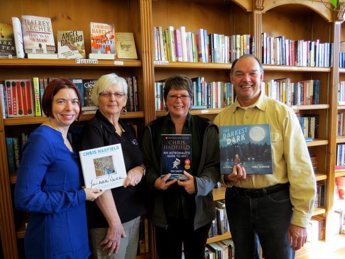 The United Way for the City of Kawartha Lakes is raising funds by selling three of former astronaut Chris Hadfield's books in advance of his May 11th keynote in Lindsay. Pictured holding the books are: Shantal Ingram, Community Investment Coordinator United Way of the City of Kawarthas Lakes; Helga Guthrie, VCCS Employment Services and United Way Campaign Cabinet member; Cheri Hogg, owner of Kent Bookstore; and Pat Twohey, Three Chairs Committee (photo courtesy of United Way of the City of Kawarthas Lakes)