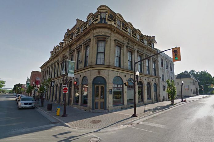 The Morrow Building at Brock and George streets in downtown Peterborough. Parkview Homes has purchased the property at 144 Brock Street (the white building at the right adjoining the Morrow Building) and has a conditional offer on the property at 450 George Street North (the building at the left adjoining the Morrow Building but with a different roof). Unlike the Morrow Building itself, neither adjoining property has been historically designated. (Photo: Google)